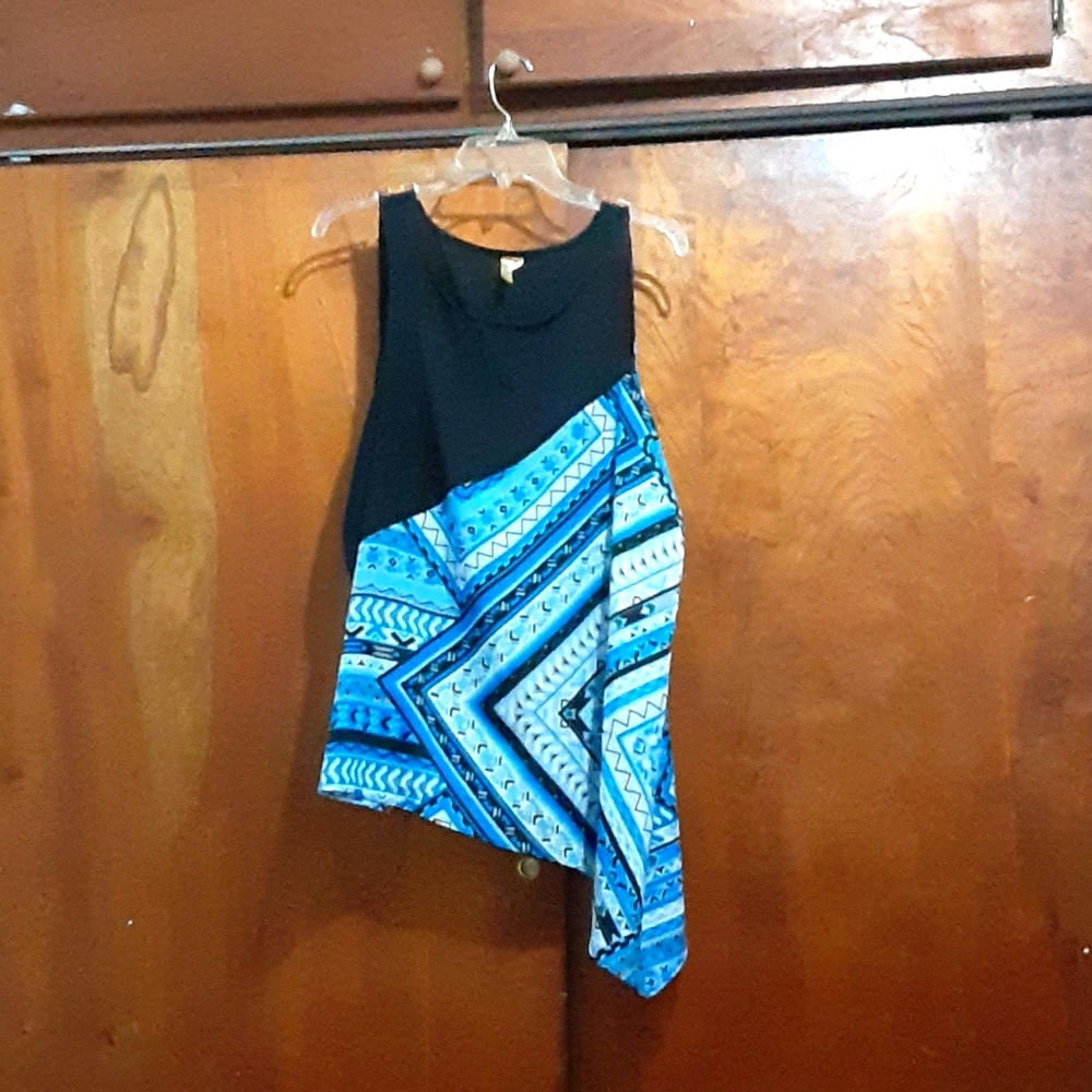 Black, blue and white blouse.
